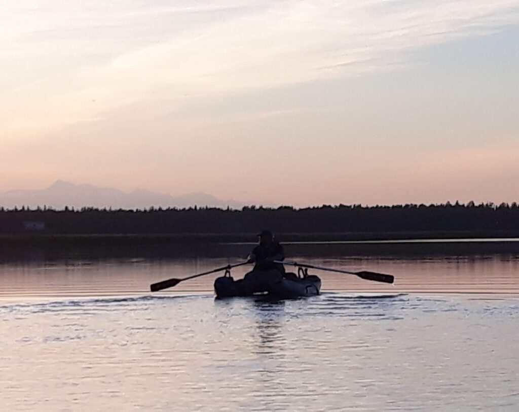 pontoon boat at sunset