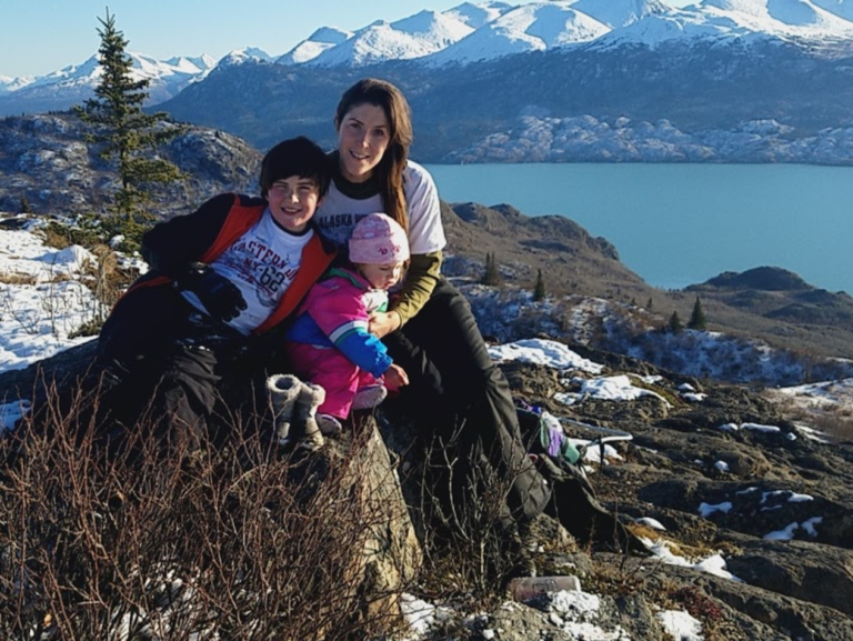 winter hiking lake in background